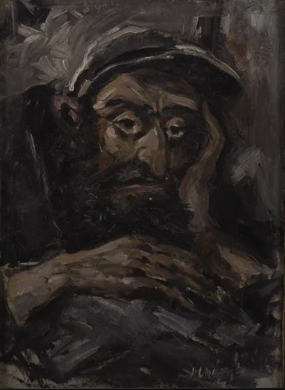 Mężczyzna przy książce — Józef Charyton